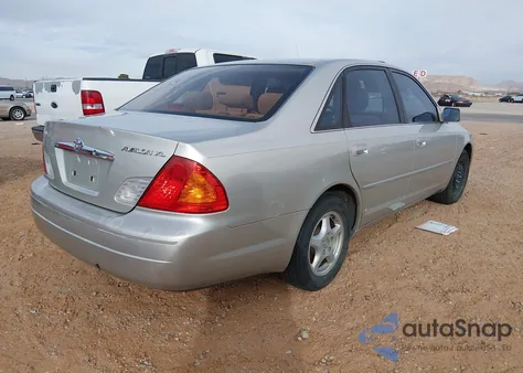 2000 Toyota Avalon Xl z USA, uszkodzony, nr VIN 4T1BF28B3YU020493